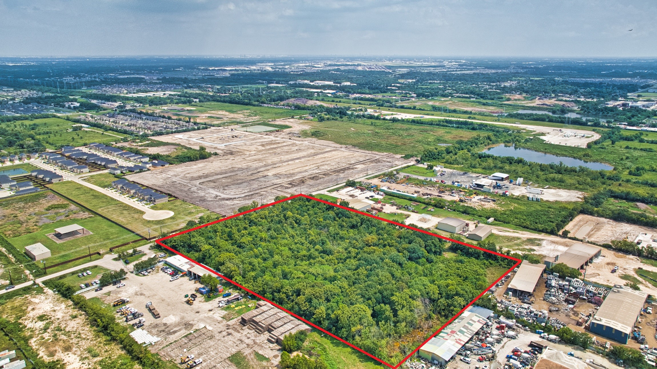 0 Fuqua Street Houston, TX 77048 - Photo 5 of 12 an aerial view of residential houses with outdoor space and river