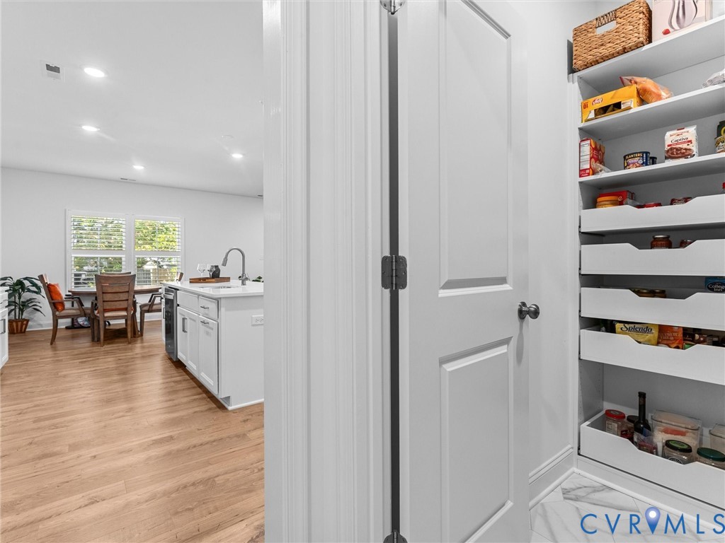 13736 Randolph Pond Lane Midlothian, VA 23114 - Photo 15 of 37 a kitchen with stainless steel appliances granite countertop a refrigerator and a wooden floors