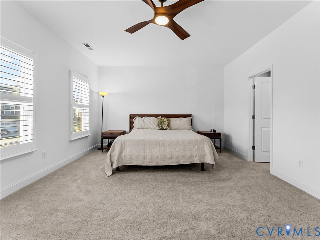 13736 Randolph Pond Lane Midlothian, VA 23114 - Photo 17 of 37 a bedroom with a bed and window