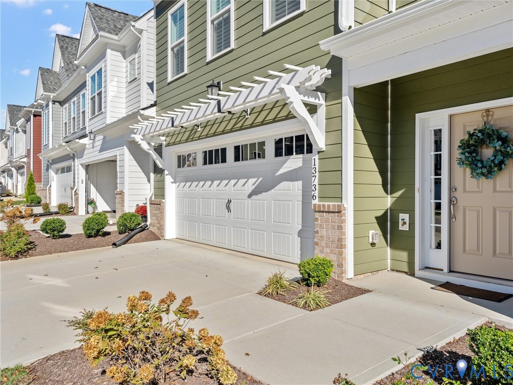 13736 Randolph Pond Lane Midlothian, VA 23114 - Photo 2 of 37 a front view of a building
