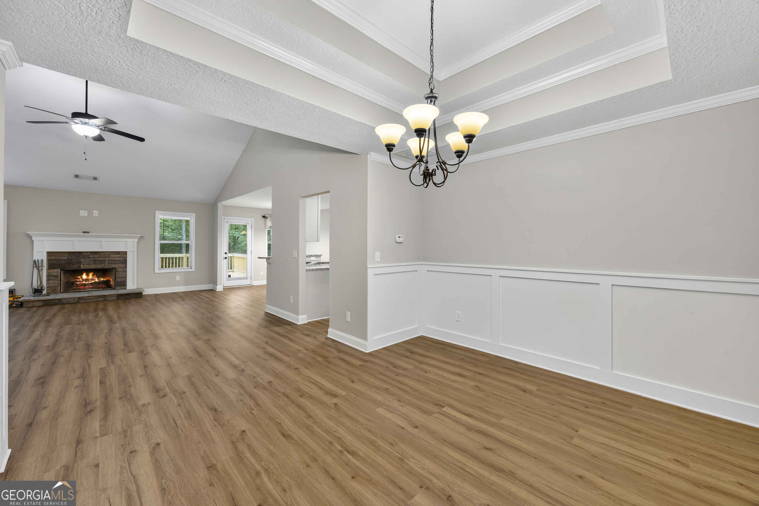 717 Oconee Lane Commerce, GA 30529 - Photo 10 of 57 a view of livingroom with hardwood floor and ceiling fan