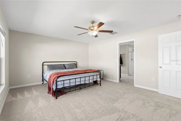 a bathroom with a granite countertop sink a shower and a mirror