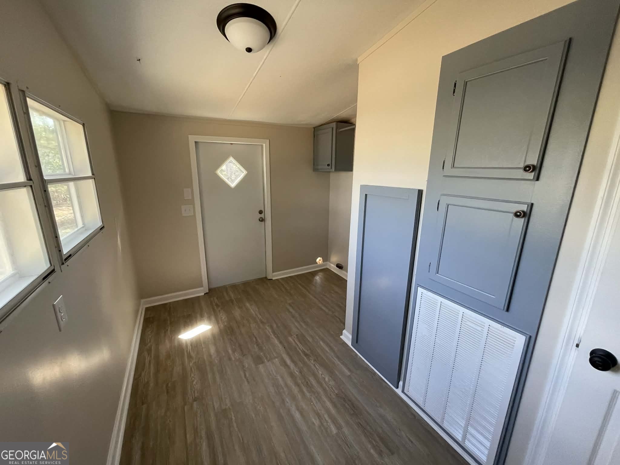 105 Senimor Court Perry, GA 31069 - Photo 14 of 27 a view of a hallway with wooden floor