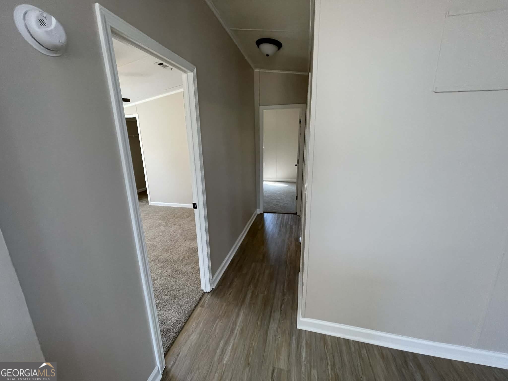 105 Senimor Court Perry, GA 31069 - Photo 15 of 27 a view of a hallway with wooden floor