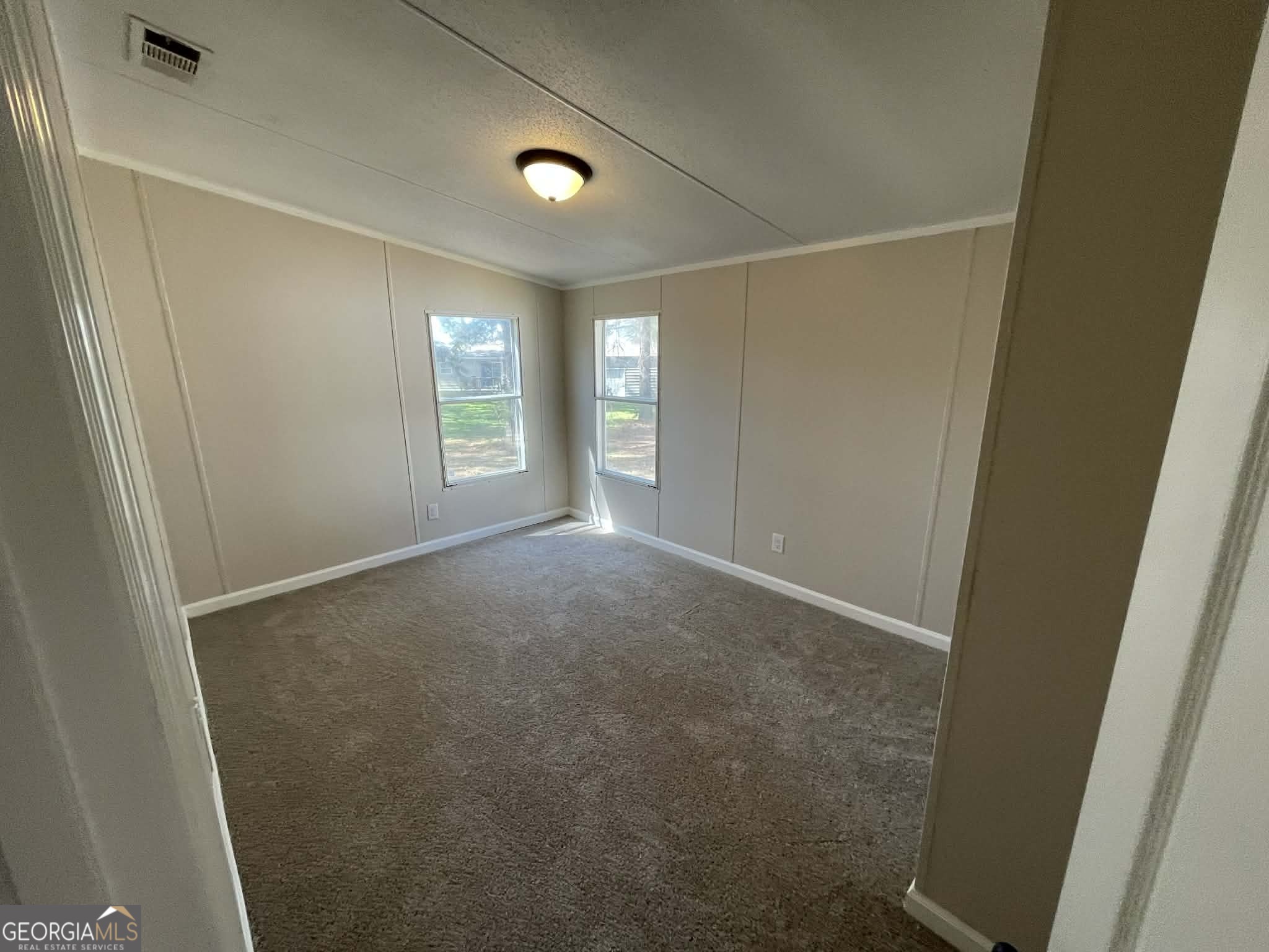 105 Senimor Court Perry, GA 31069 - Photo 18 of 27 a view of empty room with window