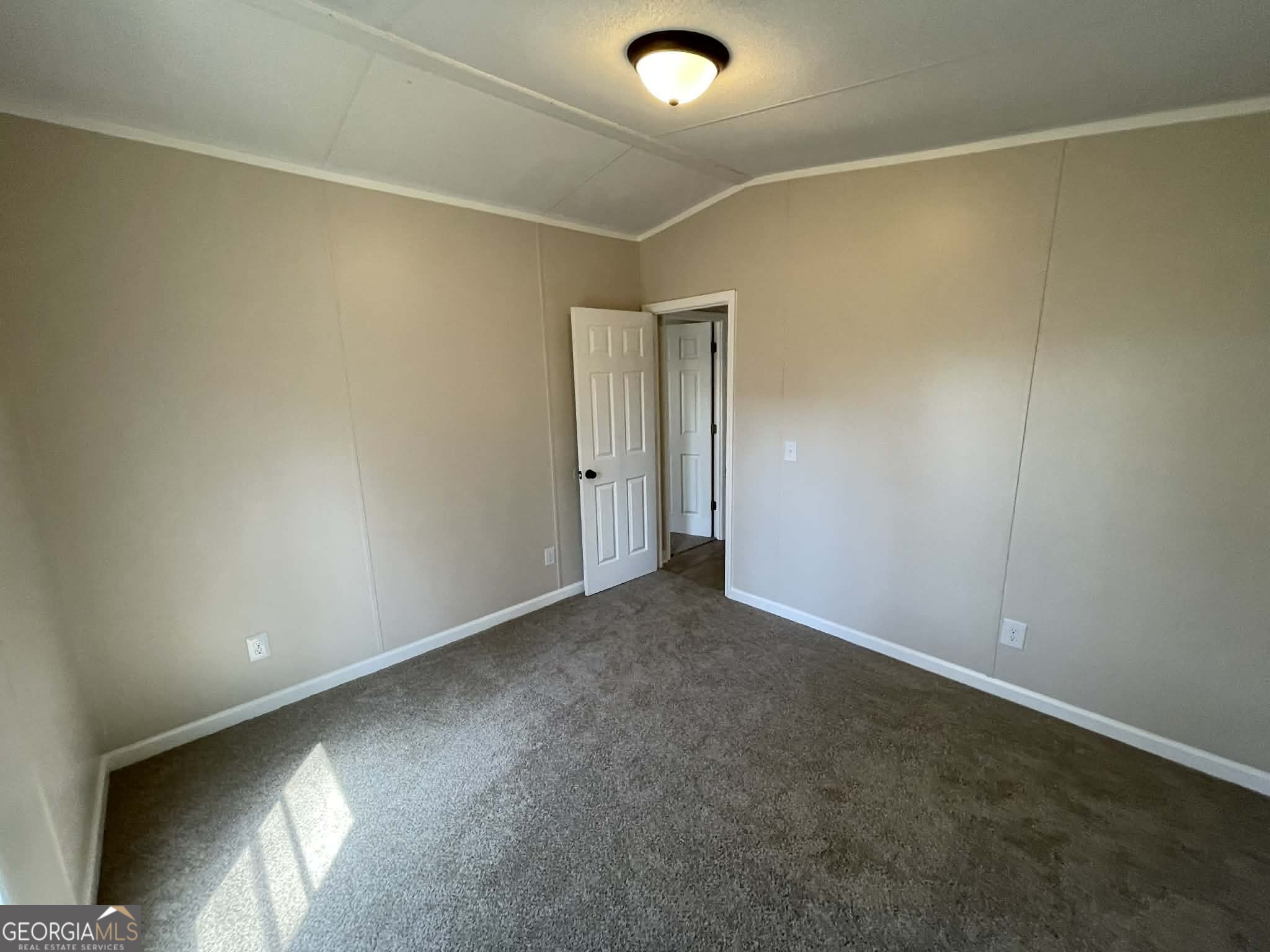 105 Senimor Court Perry, GA 31069 - Photo 22 of 27 an empty room with a empty space and windows