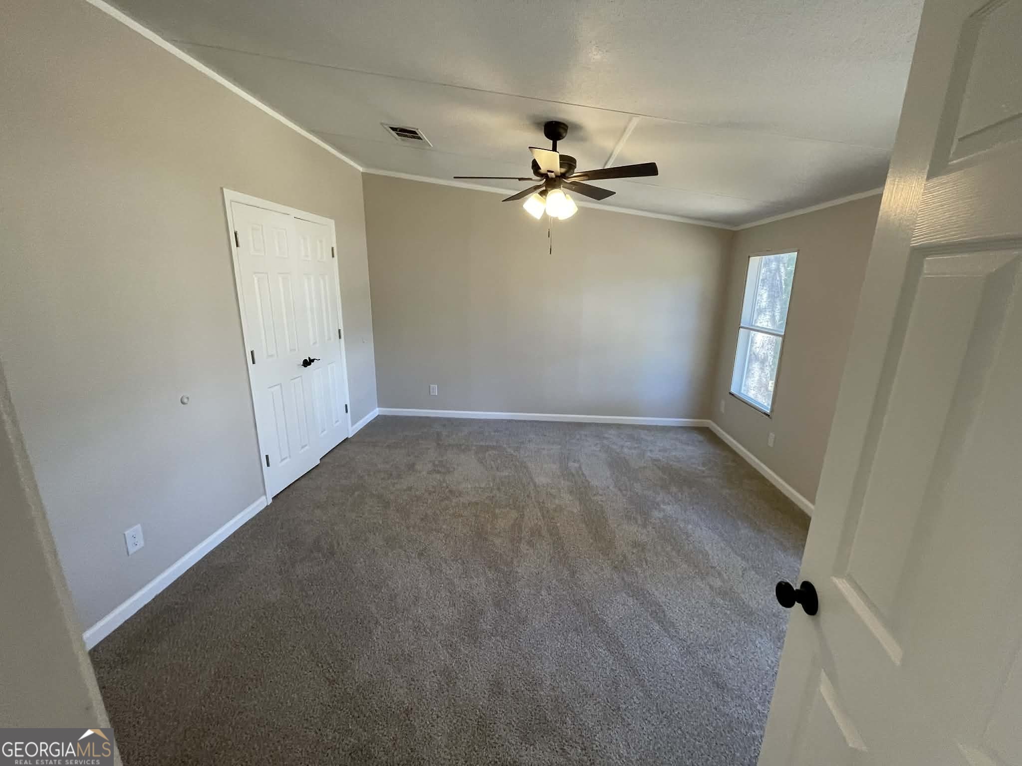 105 Senimor Court Perry, GA 31069 - Photo 23 of 27 a view of empty room with window