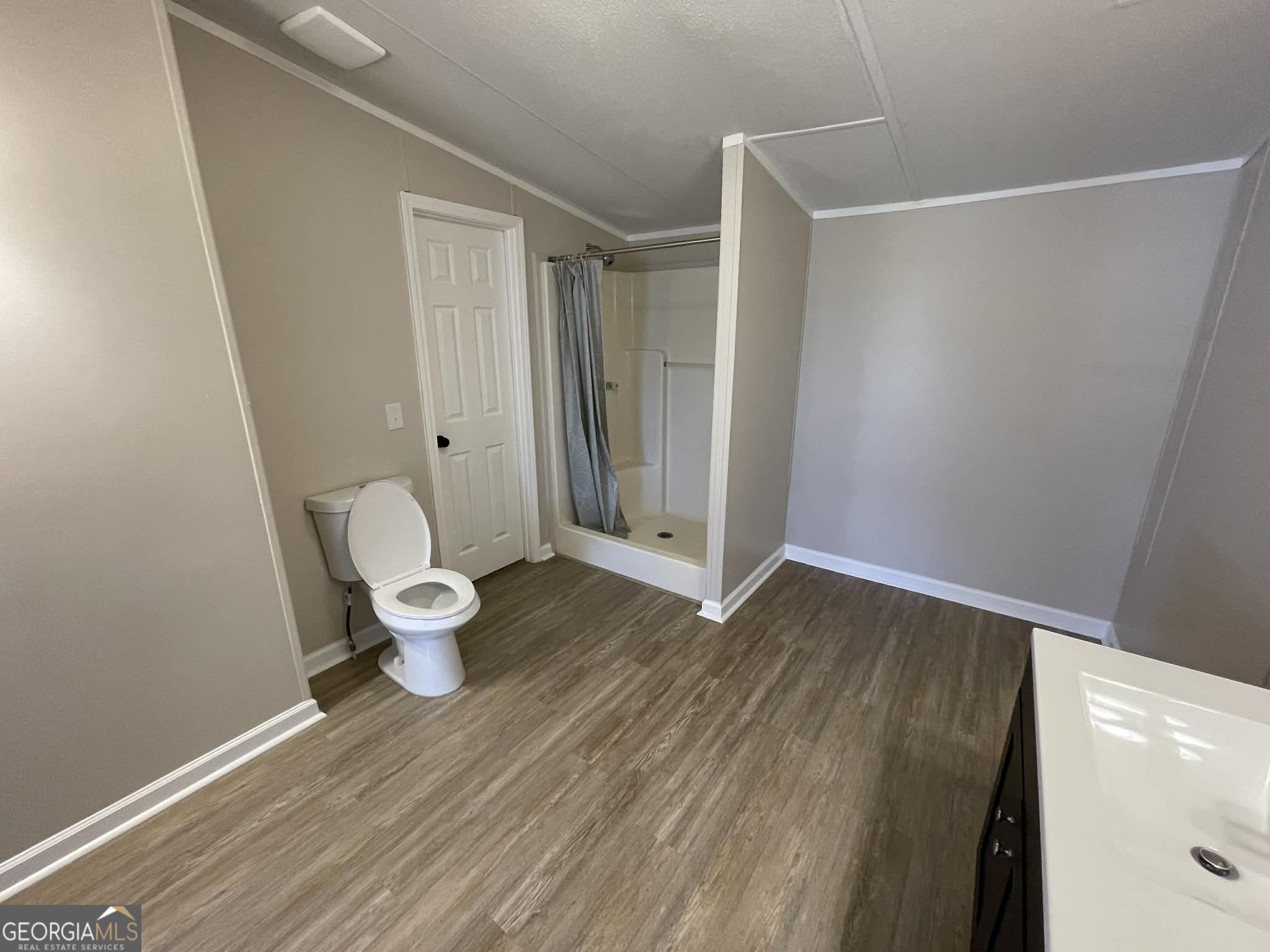 105 Senimor Court Perry, GA 31069 - Photo 27 of 27 a bathroom with a sink and a toilet