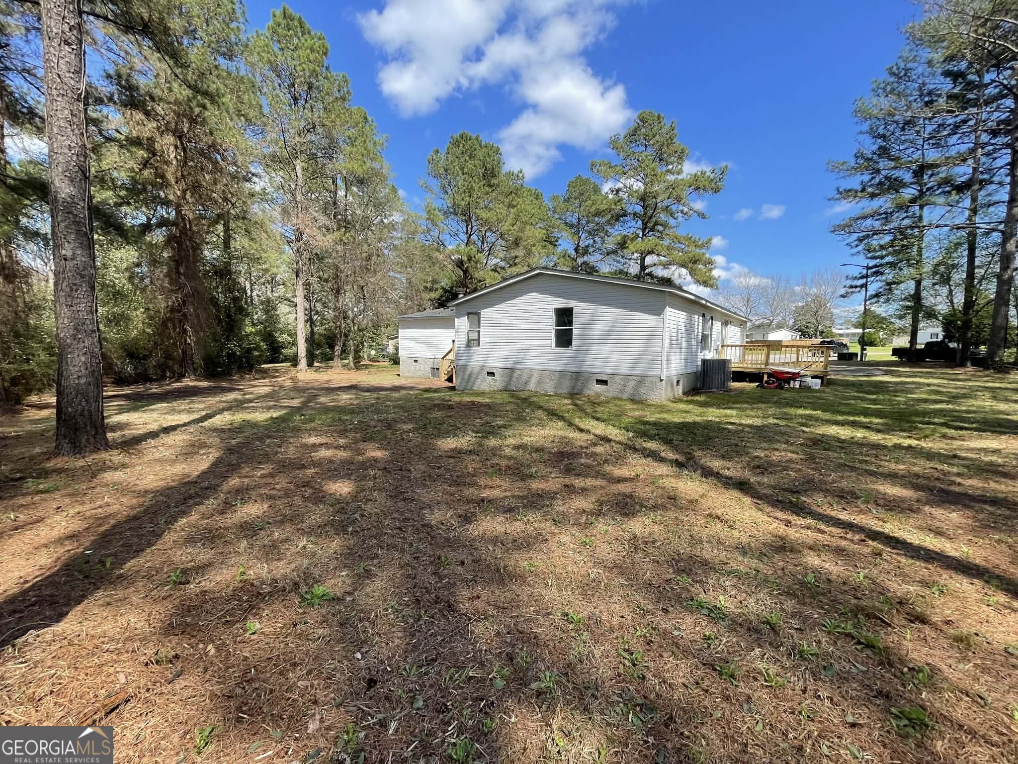 105 Senimor Court Perry, GA 31069 - Photo 3 of 27 a view of a house with a yard