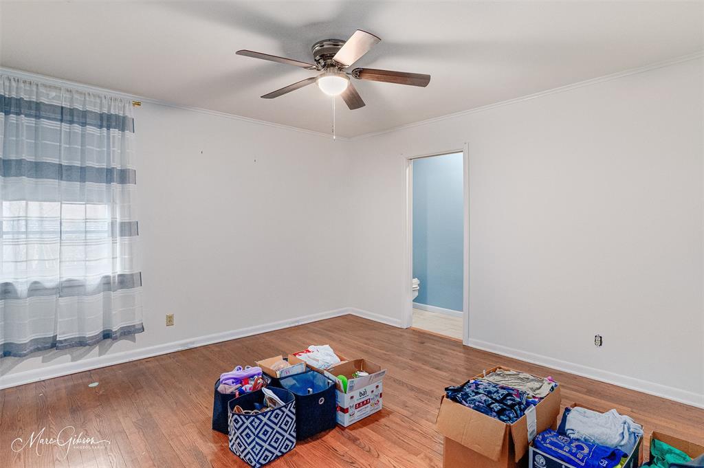 400 Southfield Road Shreveport, LA 71106 - Photo 15 of 30 a bedroom with bed and a window