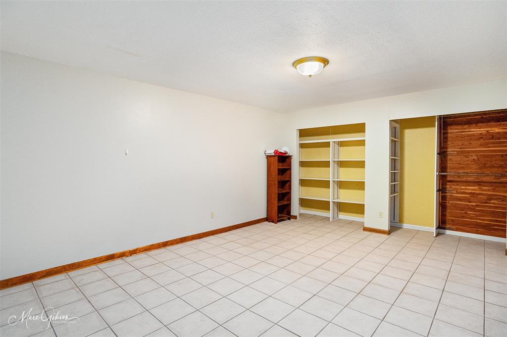 400 Southfield Road Shreveport, LA 71106 - Photo 24 of 30 a view of an empty room with wooden door