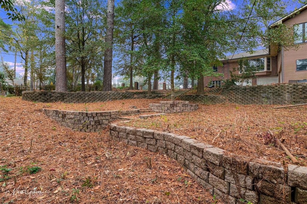 400 Southfield Road Shreveport, LA 71106 - Photo 30 of 30 a view of a yard with plants and trees