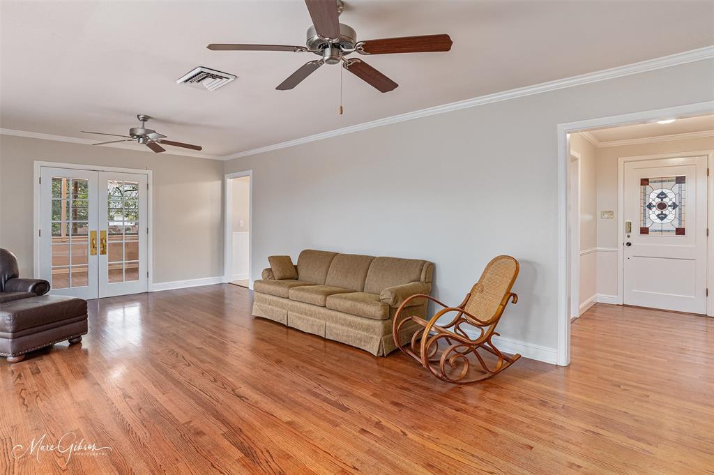 400 Southfield Road Shreveport, LA 71106 - Photo 6 of 30 a living room with furniture and a wooden floor