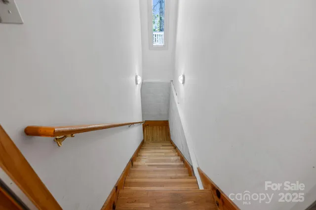 a view of hallway with stairs