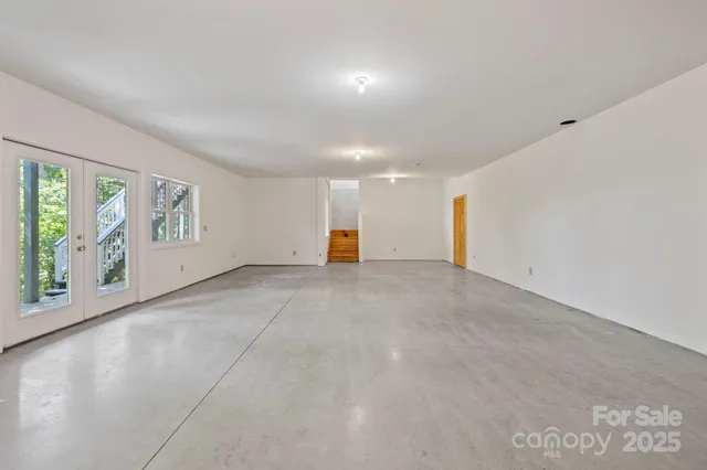 a view of an empty room with window