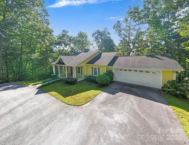 a view of house with outdoor space and street view