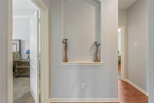 a view of a livingroom with furniture and a window