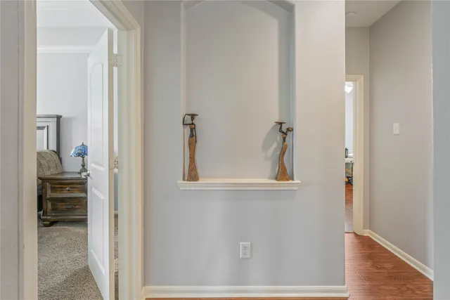 a view of a livingroom with furniture and a window