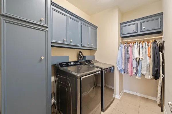 a view of an entryway with wooden floor and a fire place