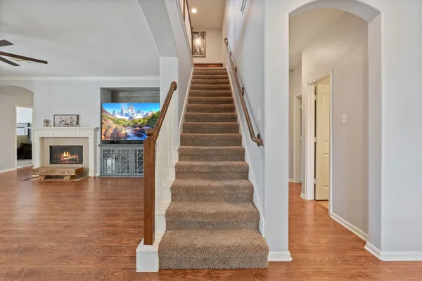 a view of entryway with wooden floor