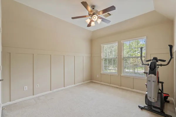 a view of a house with backyard porch and sitting area