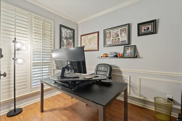 a view of a workspace with furniture