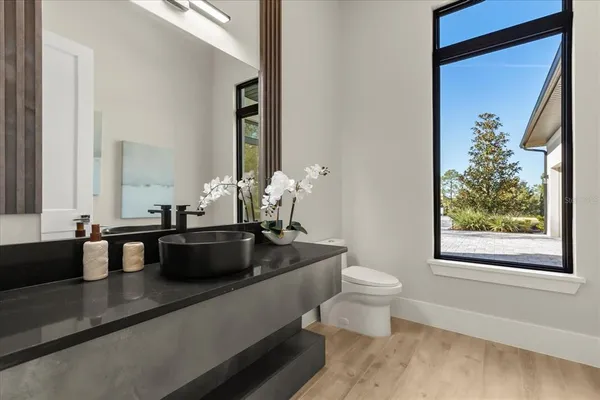 a bathroom with a bathtub and shower