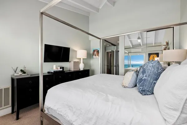 a view of a room with rack and wooden floor