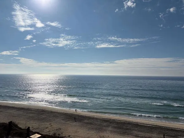 a view of beach and ocean