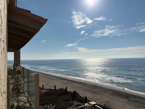 a bathroom with a sink vanity and mirror