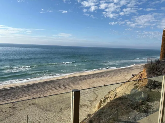 a bathroom with a shower and a toilet