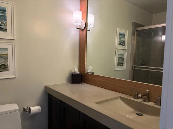 a view of a hallway with washer and dryer