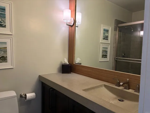 a view of a hallway with washer and dryer