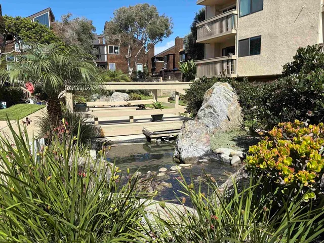 a view of swimming pool with outdoor seating