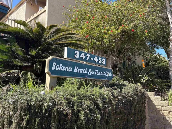 a view of swimming pool with outdoor seating and a patio
