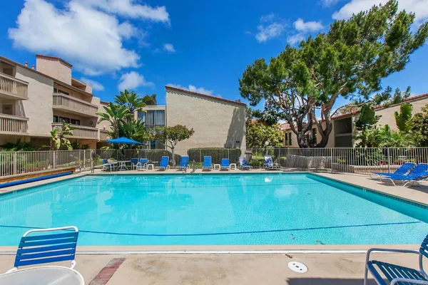 a view of a swimming pool with a lake