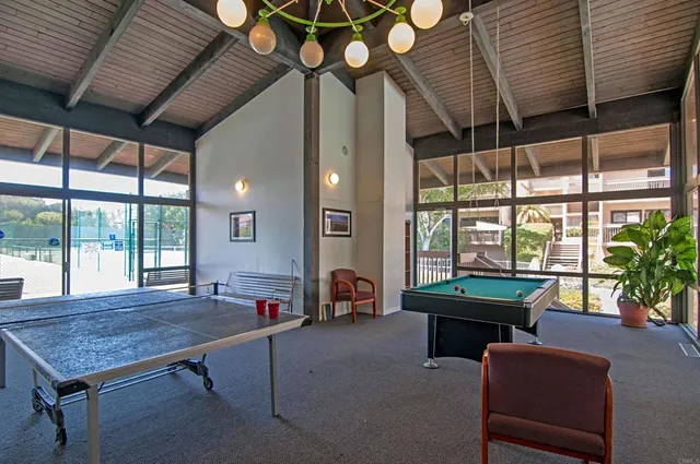 a view of a swimming pool with a lake