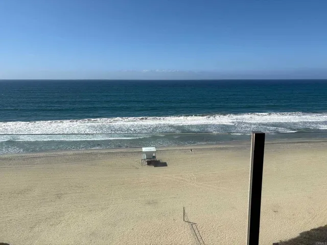 a view of beach and ocean
