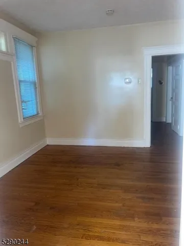 a view of room and wooden floor