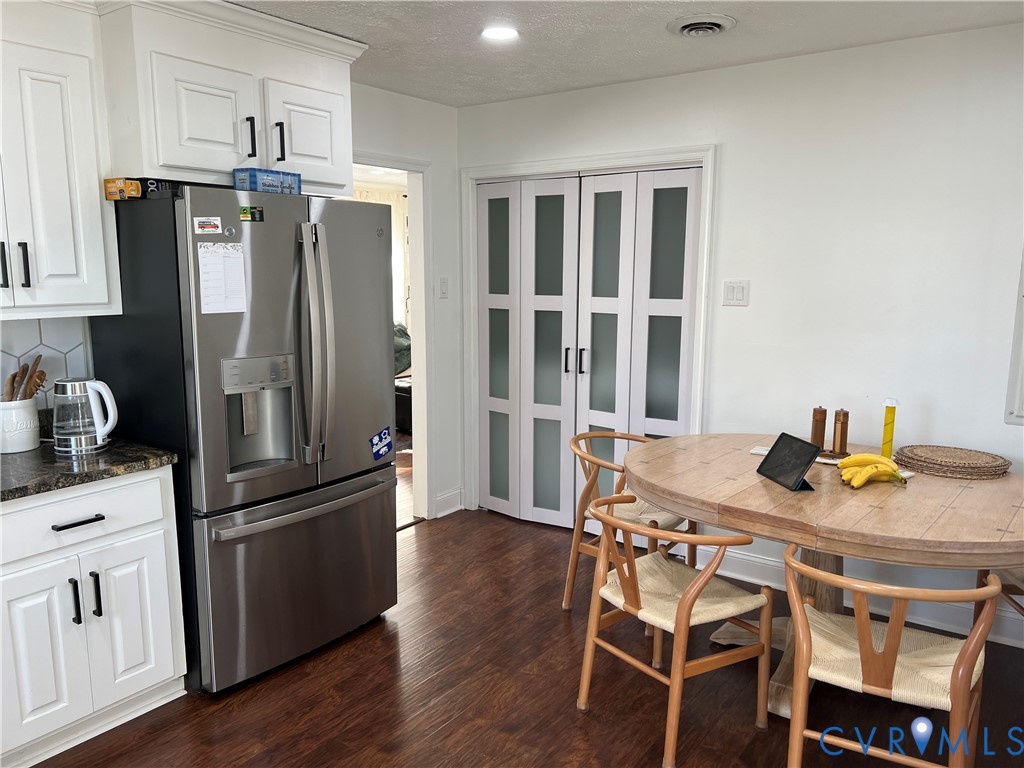 4192 Range Road Mechanicsville, VA 23111 - Photo 12 of 36 a kitchen with stainless steel appliances granite countertop a refrigerator a stove a sink and a refrigerator