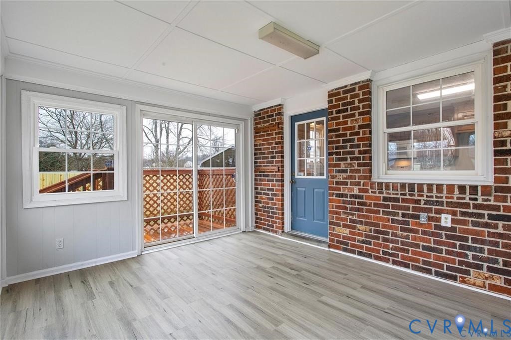 4192 Range Road Mechanicsville, VA 23111 - Photo 16 of 36 an empty room with wooden floor and windows