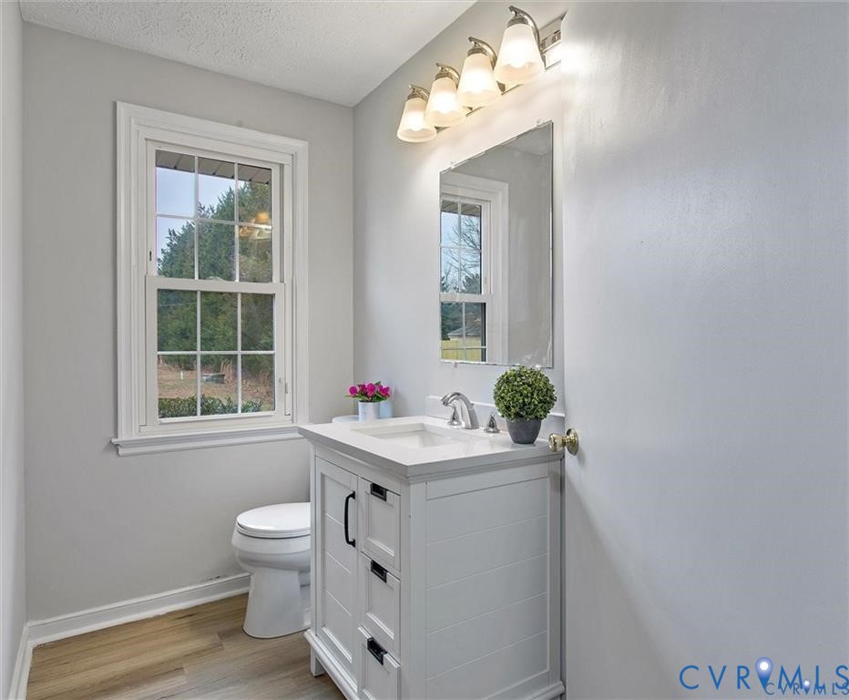 4192 Range Road Mechanicsville, VA 23111 - Photo 18 of 36 a bathroom with a sink toilet and mirror