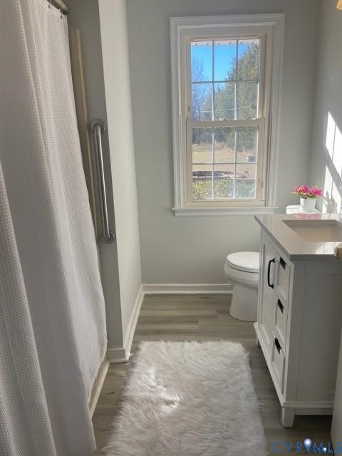 4192 Range Road Mechanicsville, VA 23111 - Photo 19 of 36 a bathroom with a sink toilet and window