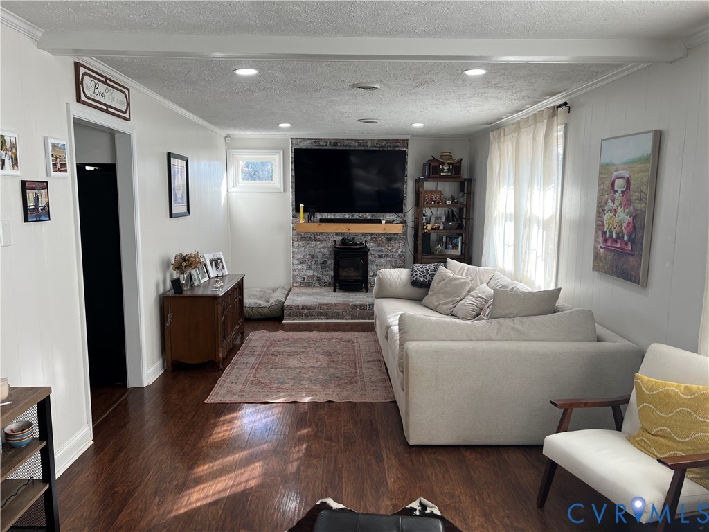 4192 Range Road Mechanicsville, VA 23111 - Photo 36 of 36 a living room with furniture and a flat screen tv