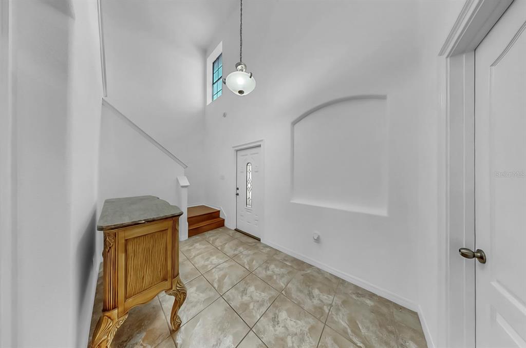 10012 Newminster Loop Ruskin, FL 33573 - Photo 25 of 59 a view of an entryway