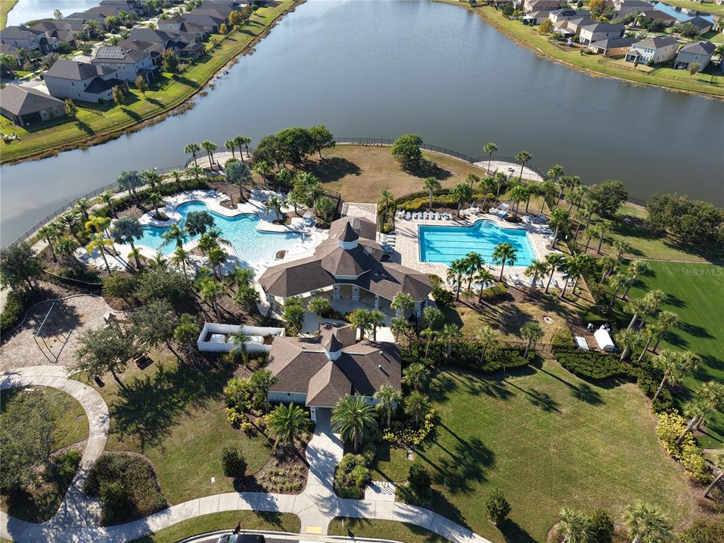 10012 Newminster Loop Ruskin, FL 33573 - Photo 55 of 59 an aerial view of a house with a yard