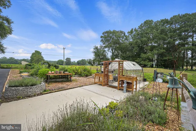 a garden view with a seating space