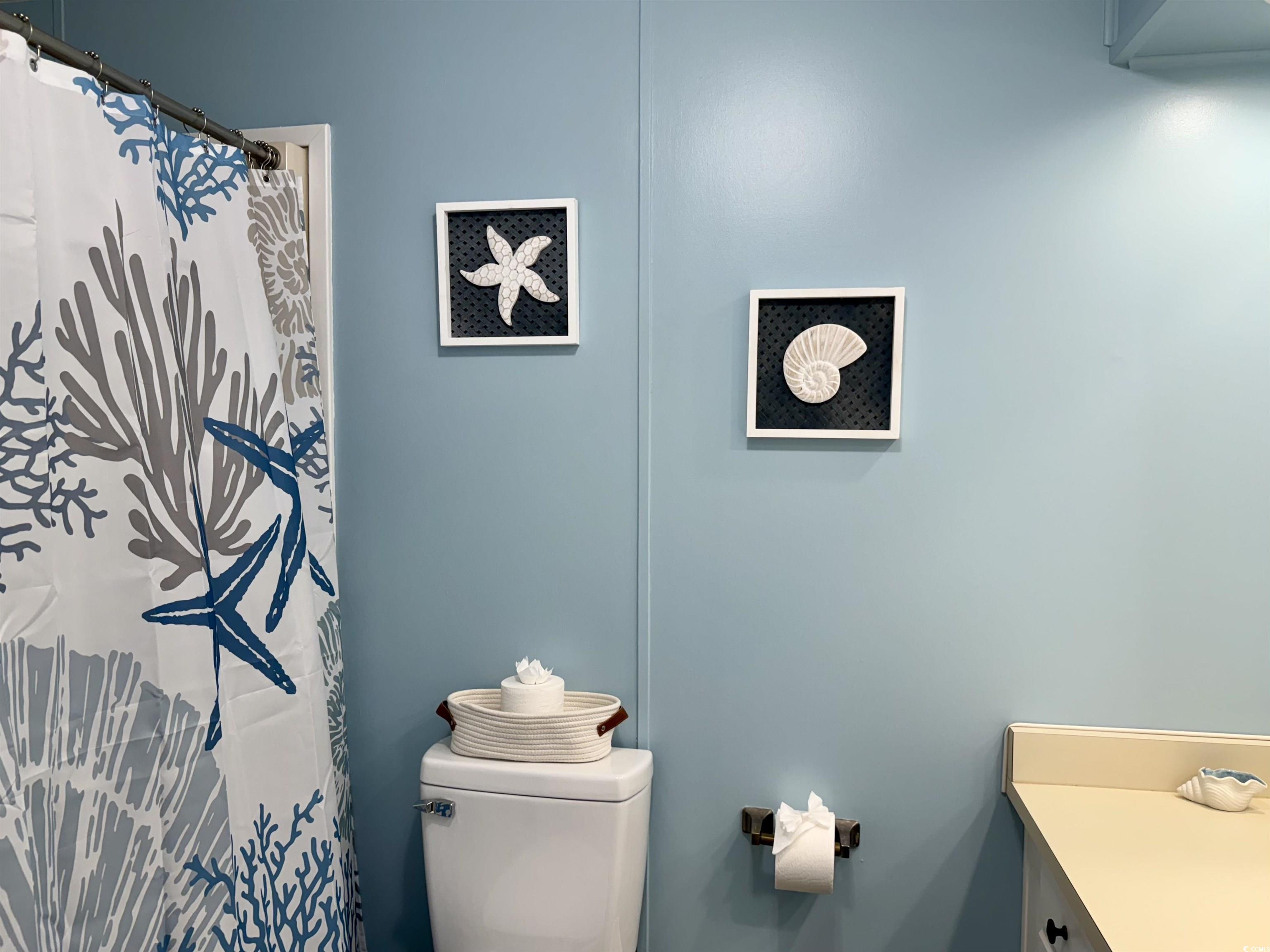 469 Sandpebble Surfside Beach, SC 29575 - Photo 19 of 39 Bathroom featuring toilet and vanity