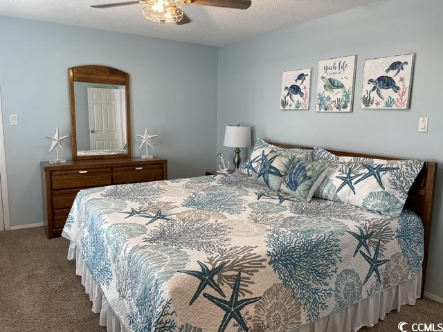 469 Sandpebble Surfside Beach, SC 29575 - Photo 20 of 39 Bedroom featuring carpet flooring and ceiling fan