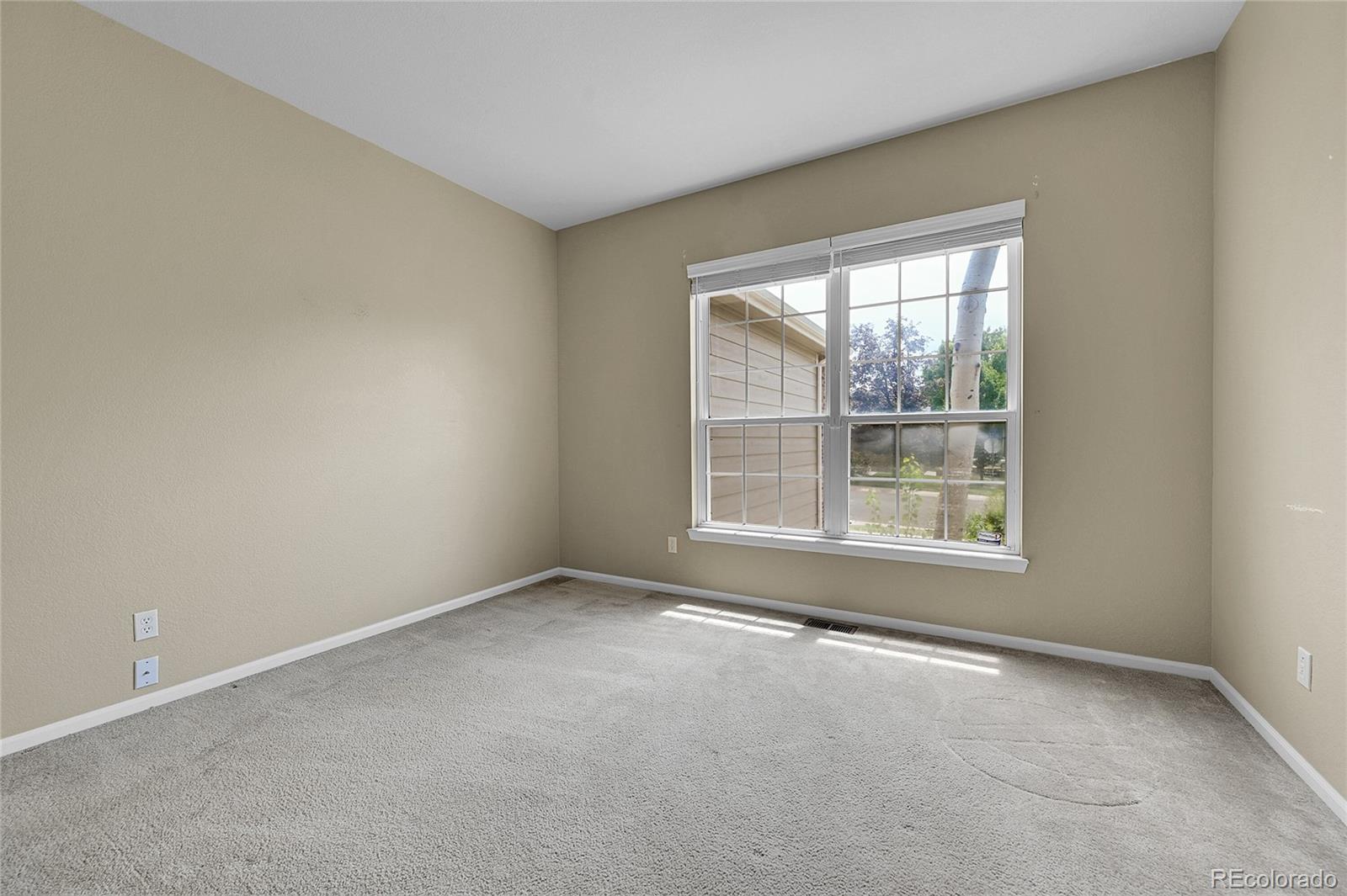 19115 East Belleview Place Centennial, CO 80015 - Photo 11 of 47 an empty room with a window
